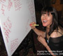 Signing the Message Board at Delta's 21st
